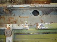 LR - 144002080 - Bulkhead under repair - missing part of rail above steering column
