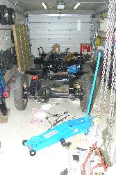 LR - 144002080 - Chassis from front in garage awaiting engine
