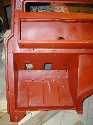 LR - 144002080 - Bulkhead - red-oxide - driver's footwell (lhs)
