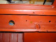 LR - 144002080 - Bulkhead - red-oxide - view of repaired "missing" section above steering wheel col