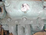 LR - 144002080 - Engine / Cylinder head from top showing casting number, cast in temperature adapto