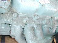 LR - 144002080 - Engine / Cylinder head from top showing casting number, cast in temperature adapto