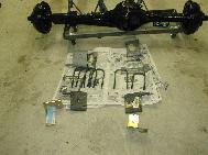 LR - 144002080 - Rear axle with U-Bolts and spring plates
